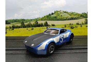 Cox Revised Chassis #5 Datsun HO Slot Car. (VIDEO) HTF