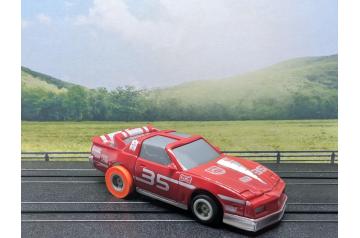 Marchon #35 Baron Ignitions Firebird TA MR-1 HO Slot Car.