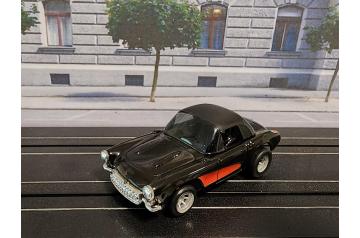 AFX Magnatraction with NOS JL '57 Black Corvette Roadster Body HO Slot Car.